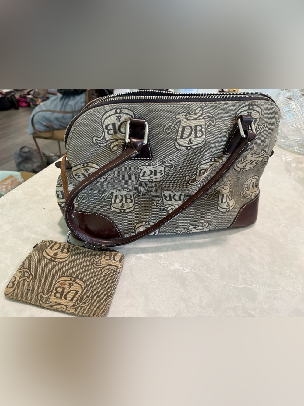 Dooney & Bourke Brown
Signature Donegal Crest Dome
Satchel, Used & Vintage - Picture 3 of 9